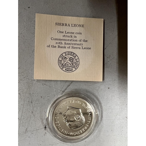 446 - A SIERRA LEONE 1974 ONE LEONE SILVER COIN. BOXED WITH COA