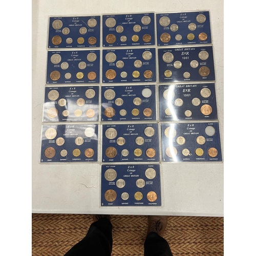 457 - THIRTEEN COINAGE OF GREAT BRITAIN CASED COIN SETS