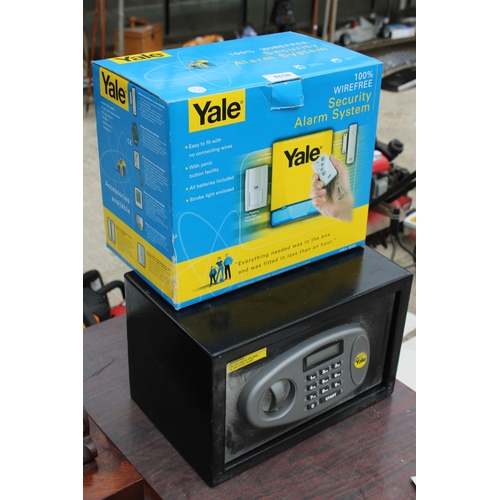 1810 - A YALE WIREFREE SECURITY ALARM SYSTEM AND A YALE DIGITAL SAFE