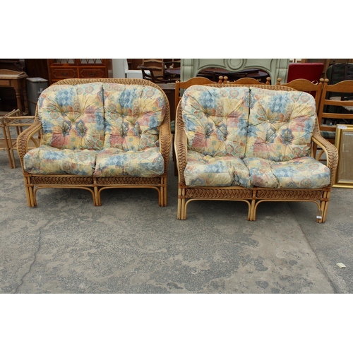 2846 - A PAIR OF BAMBOO AND WICKER TWO SEATER SETTEES