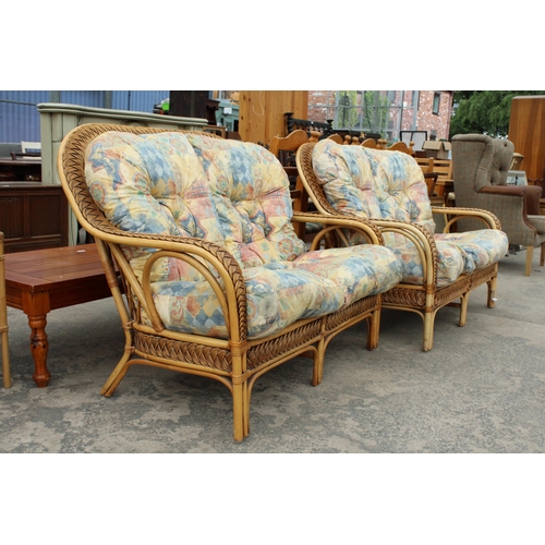 2846 - A PAIR OF BAMBOO AND WICKER TWO SEATER SETTEES