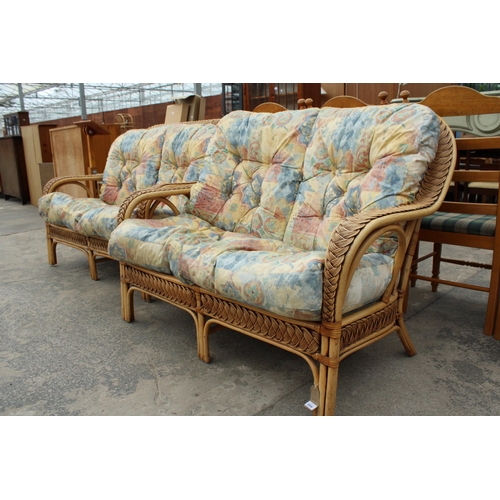 2846 - A PAIR OF BAMBOO AND WICKER TWO SEATER SETTEES