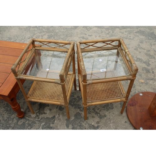 2804 - A PAIR OF BAMBOO AND CANE TABLES WITH GLASS TOPS