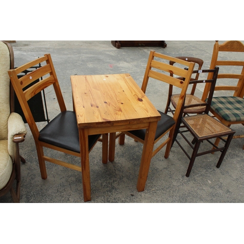 2807 - A SMALL PINE DRAW-LEAF TABLE AND TWO CHAIRS AND TWO BEDROOM CHAIRS