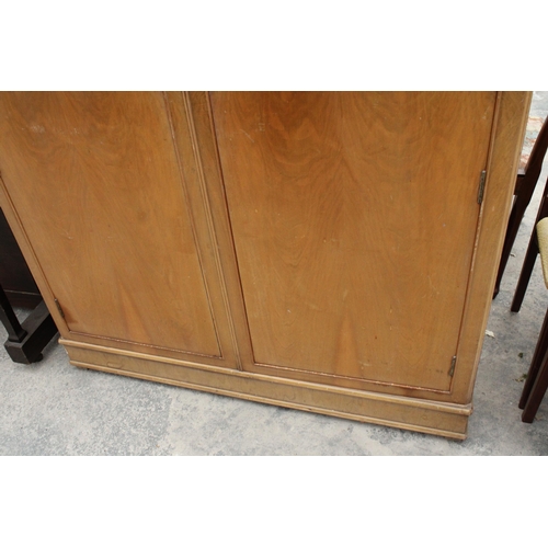 2810 - A RAY AND MILES OF LIVERPOOL TWO DOOR WALNUT WARDROBE