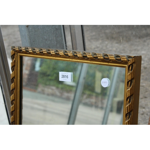 2816 - A GILT FRAMED WALL MIRROR 25