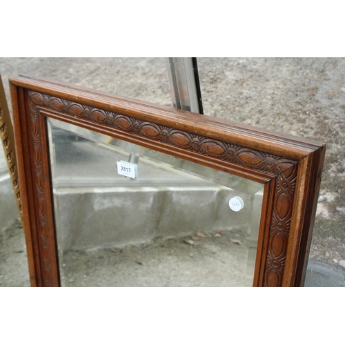 2817 - AN EDWARDIAN CARVED OAK FRAMED WALL MIRROR WITH BEVEL EDGE, 25