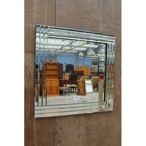 2822 - A CUT BEVELLED WALL MIRROR, 23.5