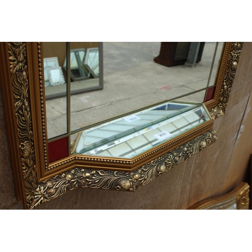 2825 - A GILT EFFECT WALL MIRROR WITH COLOURED GLASS AND MIRRORED SHELF, 35