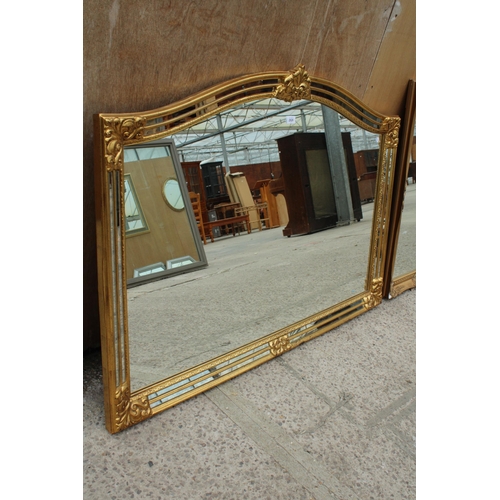 2826 - A GILT EFFECT OVERMANTEL MIRROR WITH DOUBLED MIRRORED EDGE AND FOLIATE DECORATION