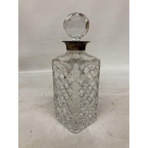 47 - A HOBNAIL CUT WHISKY DECANTER WITH A BIRMINGHAM HALLMARK SILVER COLLAR