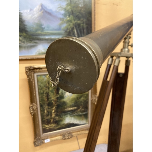 60 - A VINTAGE BRASS TELESCOPE ON A WOOD AND BRASS TRIPOD