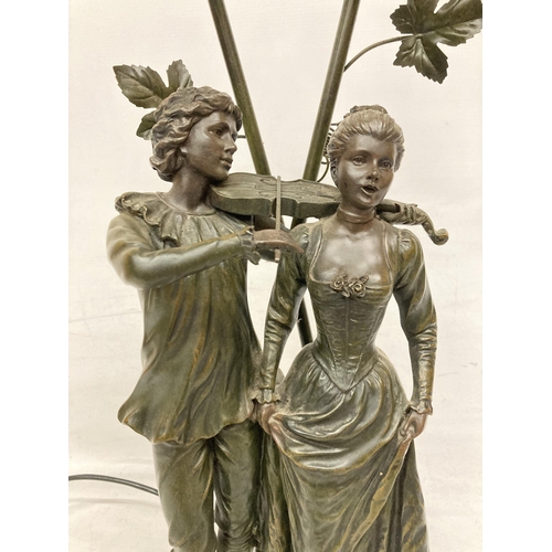 67 - AN ART NOUVEAU STYLE TWIN FIGURE TABLE LAMP