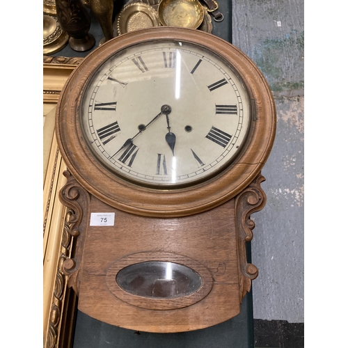 75 - A VICTORIAN STYLE OAK CASED WALL CLOCK WITH PENDULUM