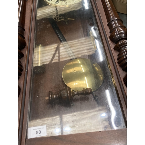 80 - A LONG CASE WALL CLOCK WITH PENDULUM AND WEIGHTS IN MAHOGANY CASING