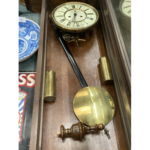 80 - A LONG CASE WALL CLOCK WITH PENDULUM AND WEIGHTS IN MAHOGANY CASING