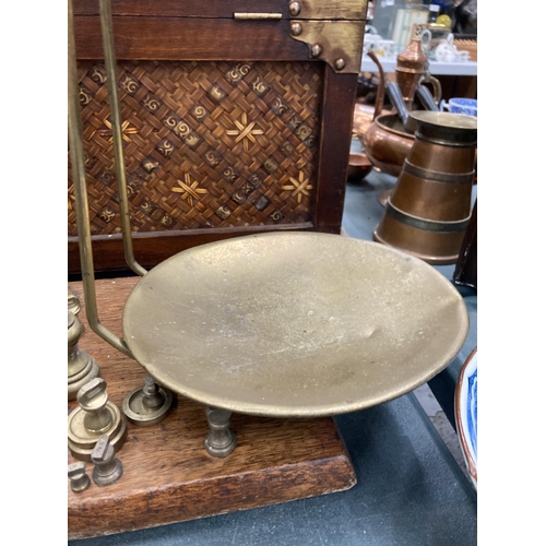 81 - A SET OF W.T. AVERY LTD BIRMINGHAM BRASS SCALES AND WEIGHTS