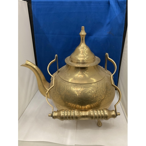 87 - A VINTAGE BRASS LARGE KETTLE WITH AN ETCHED FLORAL DESIGN