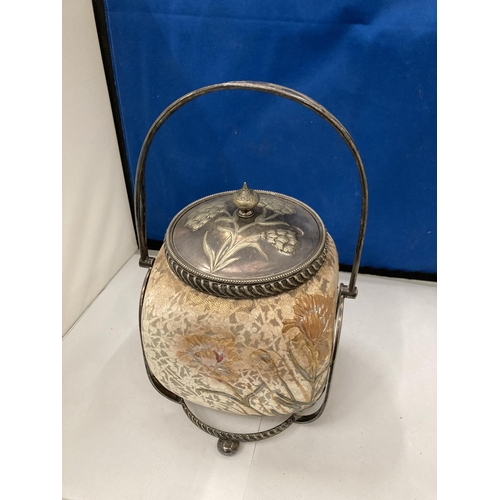 97 - AN ANTIQUE DOULTON BURSLEM SEMI PORCELAIN BISCUIT BARREL WITH SILVER PLATED COVER AND SWING HANDLE