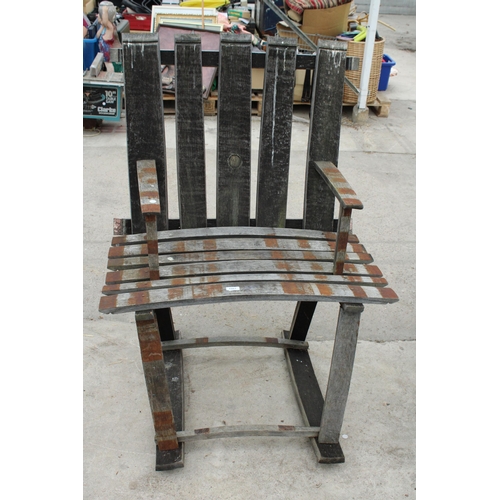 1987 - A GARDEN ROCKING CHAIR FORMED FROM A BARREL