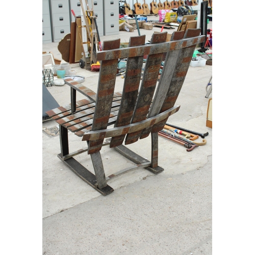 1987 - A GARDEN ROCKING CHAIR FORMED FROM A BARREL