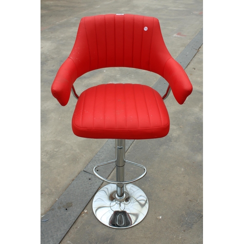 2848 - A PUMP STOOL ON POLISHED CHROME BASE WITH BRIGHT RED FAUX LEATHER SEAT AND ARMS