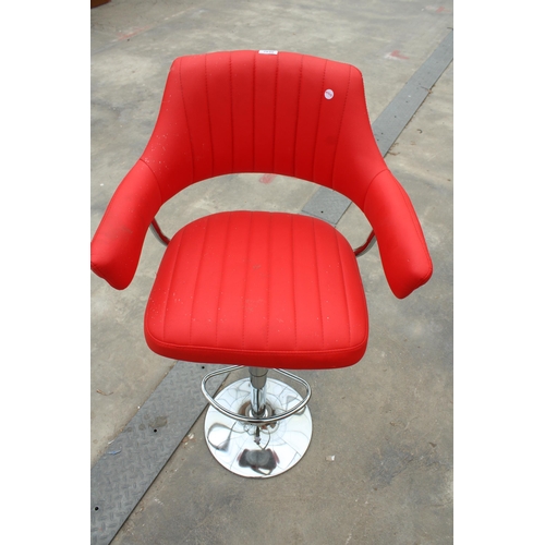 2848 - A PUMP STOOL ON POLISHED CHROME BASE WITH BRIGHT RED FAUX LEATHER SEAT AND ARMS