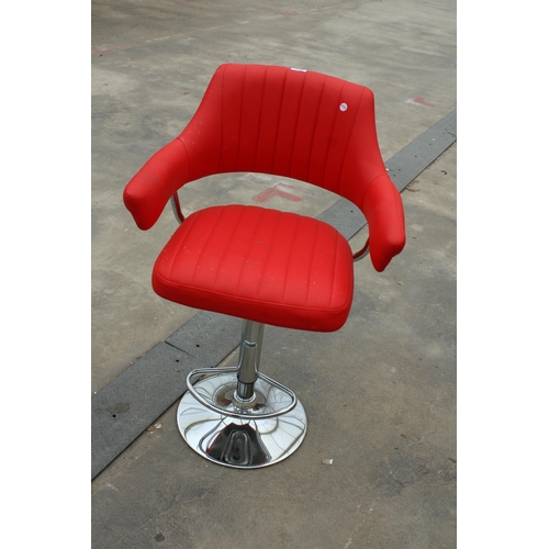 2848 - A PUMP STOOL ON POLISHED CHROME BASE WITH BRIGHT RED FAUX LEATHER SEAT AND ARMS