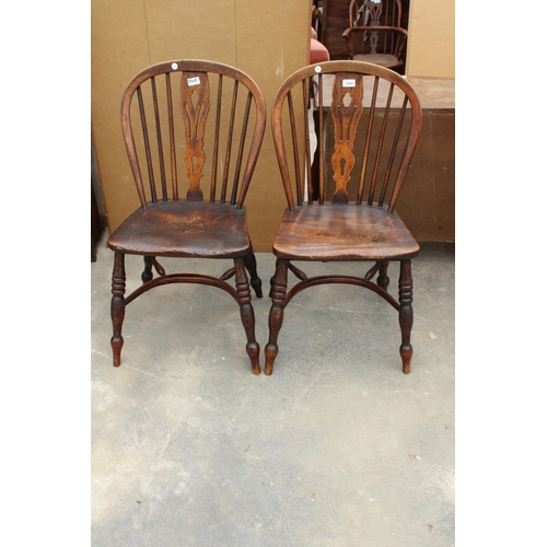 2849 - A PAIR OF 19TH CENTURY ELM WINDSOR CHAIRS WITH PIERCED SPLAT BACKS AND CRINOLINE BOWS