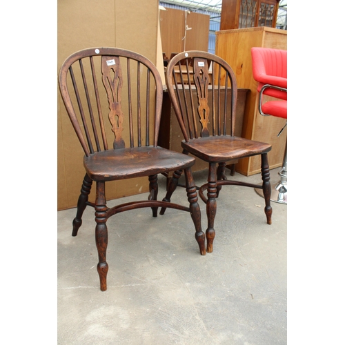 2849 - A PAIR OF 19TH CENTURY ELM WINDSOR CHAIRS WITH PIERCED SPLAT BACKS AND CRINOLINE BOWS