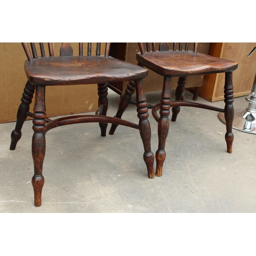 2849 - A PAIR OF 19TH CENTURY ELM WINDSOR CHAIRS WITH PIERCED SPLAT BACKS AND CRINOLINE BOWS