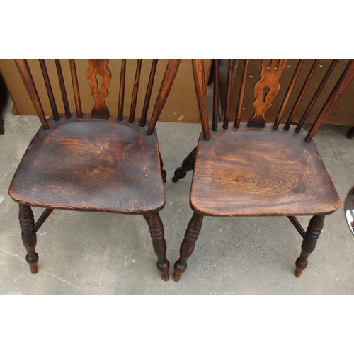 2849 - A PAIR OF 19TH CENTURY ELM WINDSOR CHAIRS WITH PIERCED SPLAT BACKS AND CRINOLINE BOWS