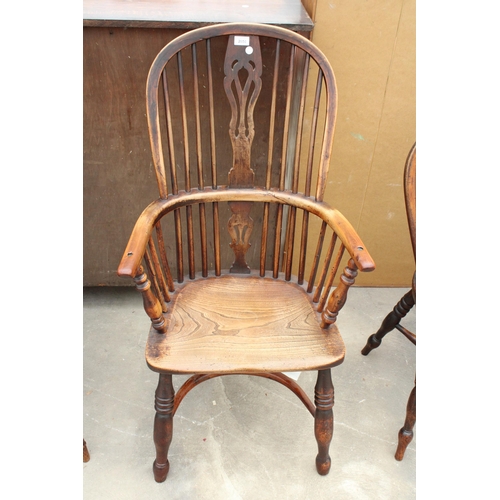 2850 - A 19TH CENTURY ELM HIGH BACK WINDSOR CHAIR WITH PIERCED SPLAT BACK AND CRINOLINE BOW