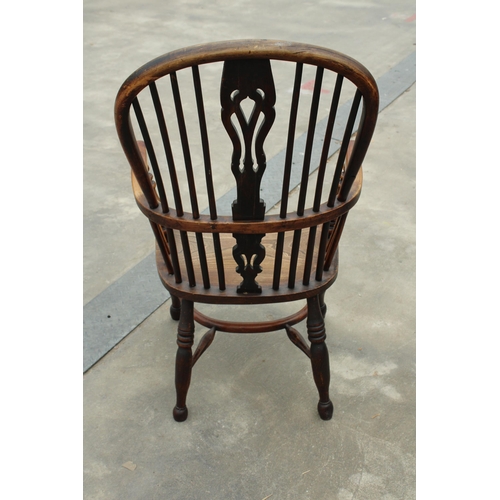 2850 - A 19TH CENTURY ELM HIGH BACK WINDSOR CHAIR WITH PIERCED SPLAT BACK AND CRINOLINE BOW