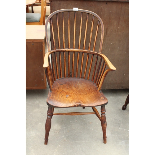 2851 - A 19TH CENTURY ELM HIGH BACK WINDSOR CHAIR WITH SPINDLE BACK AND SWEPT ARMS