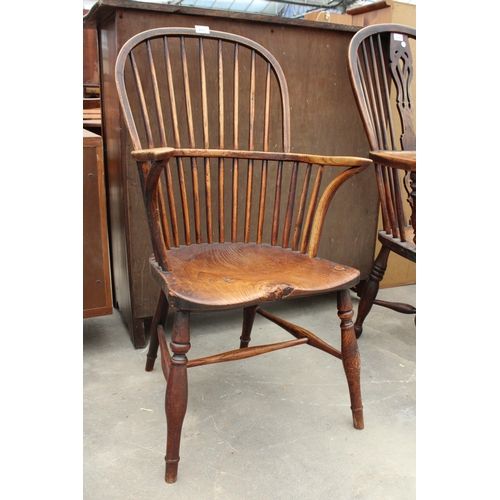 2851 - A 19TH CENTURY ELM HIGH BACK WINDSOR CHAIR WITH SPINDLE BACK AND SWEPT ARMS