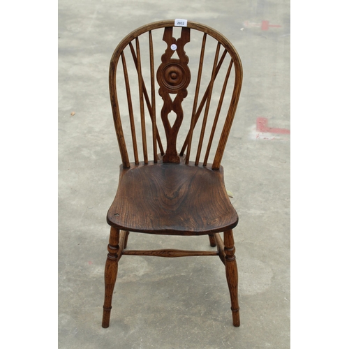 2852 - A 19TH CENTURY ELM BULLSEYE BACK KITCHEN CHAIR