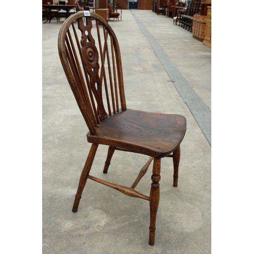 2852 - A 19TH CENTURY ELM BULLSEYE BACK KITCHEN CHAIR