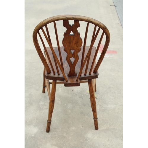 2852 - A 19TH CENTURY ELM BULLSEYE BACK KITCHEN CHAIR