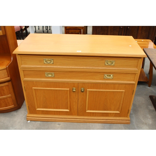 2856 - AN OAK CABINET WITH TWO DRAWERS AND TWO CUPBOARDS WITH CAMPAIGN STYLE HANDLES, 48