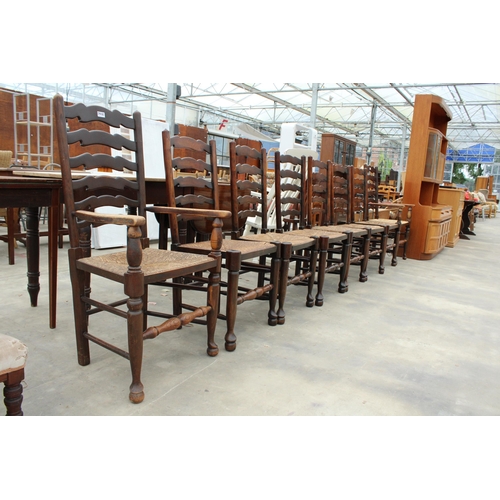 2858 - EIGHT ELM LANCASHIRE STYLE LADDER BACK DINING CHAIRS WITH RUSH SEATS, TWO BEING CARVERS