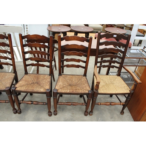 2858 - EIGHT ELM LANCASHIRE STYLE LADDER BACK DINING CHAIRS WITH RUSH SEATS, TWO BEING CARVERS