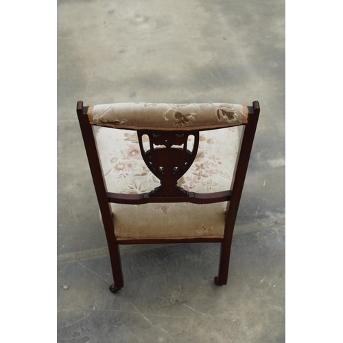 2859 - A LATE VICTORIAN LOW NURSING CHAIR