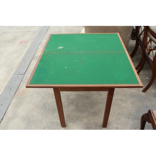 2865 - A MODERN TEAK FOLD OVER CARD TABLE