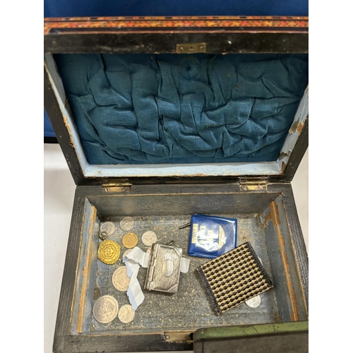 382A - AN INLAID BOX CONTAINING A VESTA CASE, WORLD COINS AND FIVE COMMEMORATIVE CROWNS