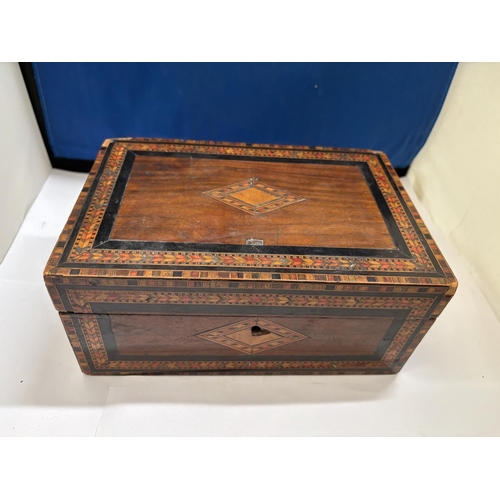 382A - AN INLAID BOX CONTAINING A VESTA CASE, WORLD COINS AND FIVE COMMEMORATIVE CROWNS