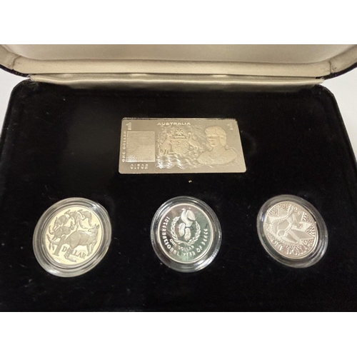 421A - A ROYAL AUSTRALIAN MINT “THE SILVER DOLLARS , 1990 MASTERPIECES IN SILVER” . BOXED WITH COA .