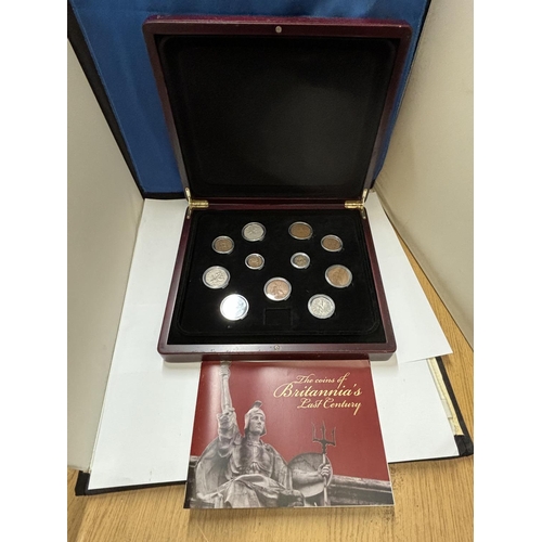 423A - THE COINS OF BRITAIN , LAST CENTURY , HOUSED IN WOODEN BOX .