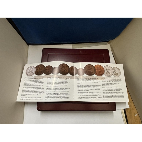 423A - THE COINS OF BRITAIN , LAST CENTURY , HOUSED IN WOODEN BOX .