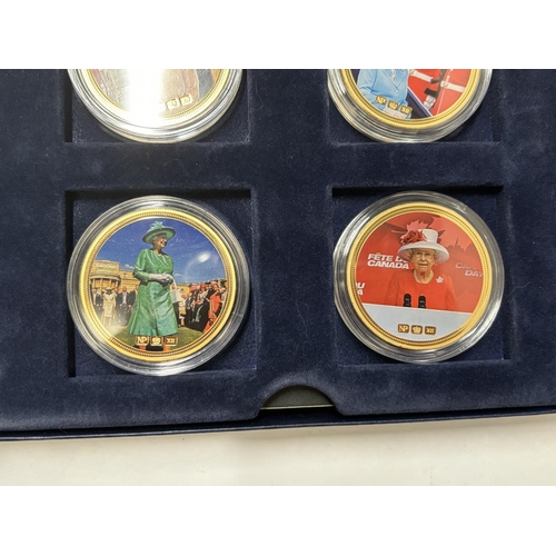 430A - A BOXED COLLECTION OF 6 UK “DIAMOND JUBILEE” COMMEMORATIVE MEDALLIONS